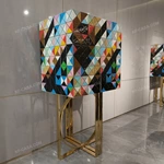 Tall Four-Door Sideboard with Multicolor Faceted Geometric Panels Nine Internal Drawers and Gold-Tone High-Gloss Stainless Steel Circular Base